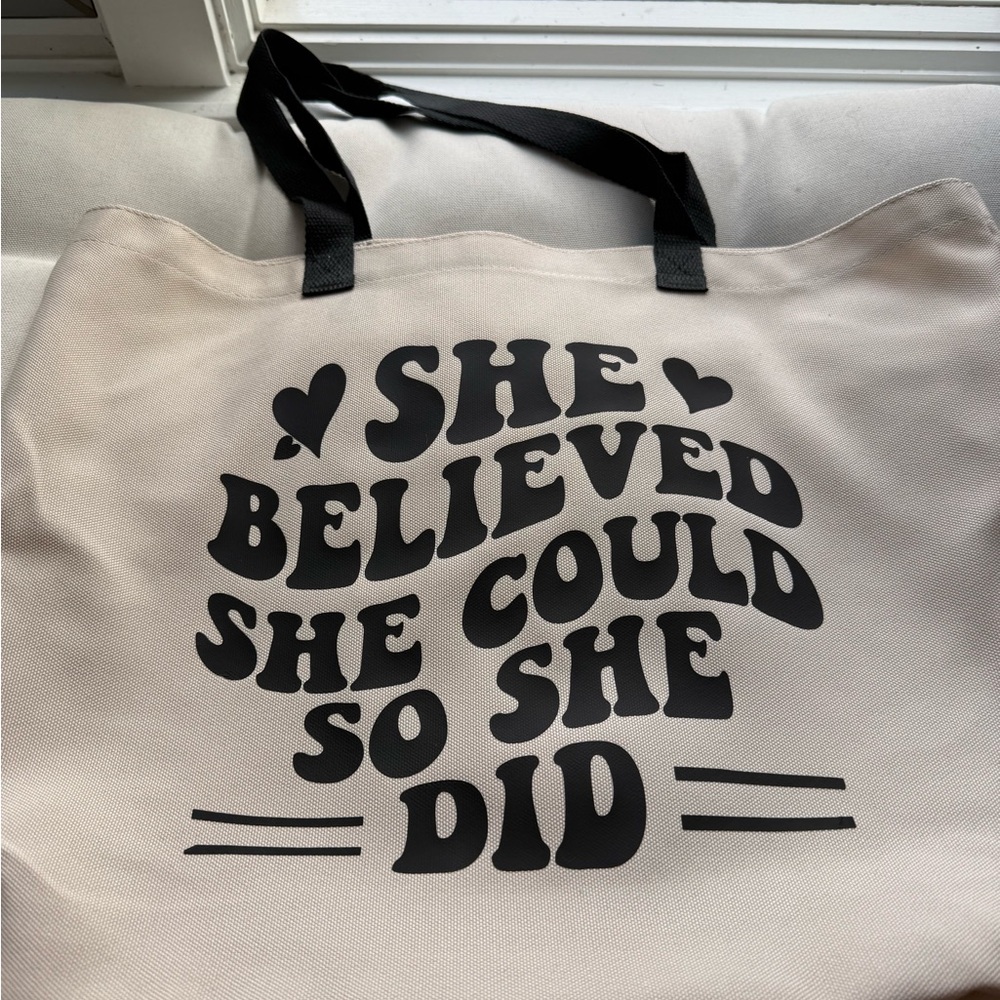 Empowering Cream Tote Bag with Black Accents